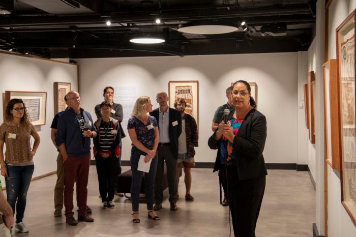 Crowd watching Helen Anu speaking at the opening of Sea Country