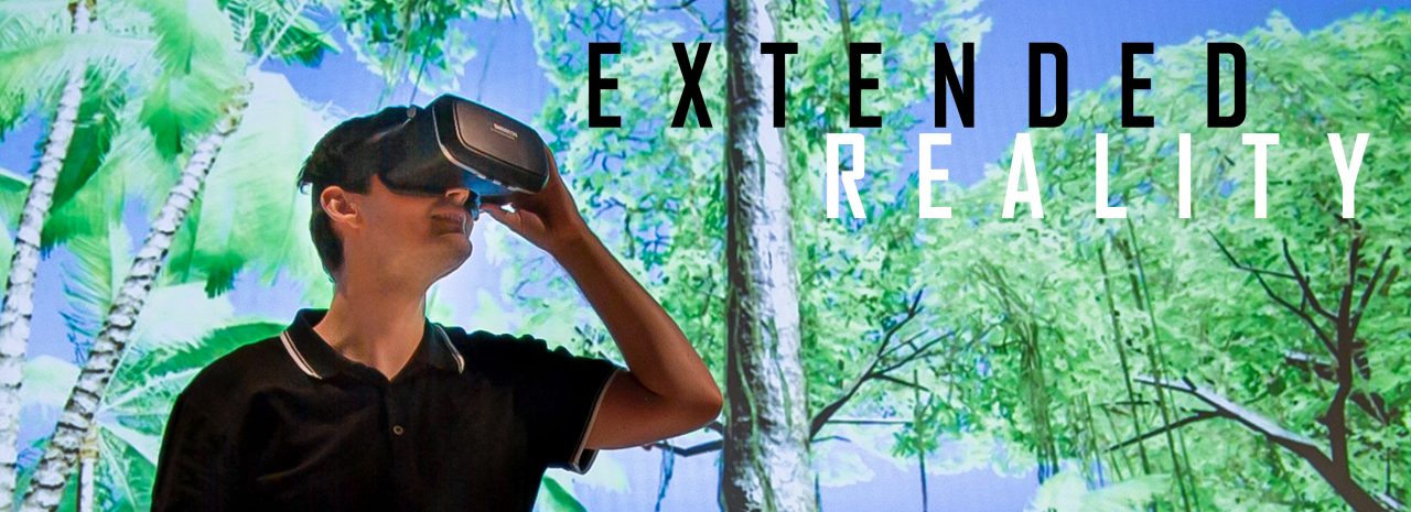 A man wearing a virtual reality headset with a 3D generated forest in the background